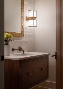Custom home bathroom with gold and wood accents