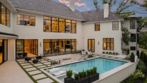 View of pool in the back yard of Belton MO custom built home