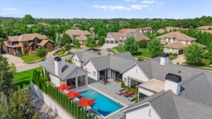 Pool deck and pool house at custom built Overland Park KS home