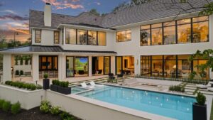 View of pool in the back yard of Belton MO custom built home