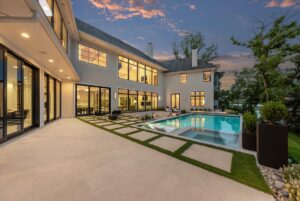 View of back yard and pool of Belton MO custom built home