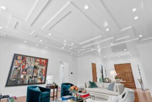 Custom crown molding and ceiling lighting in luxurious Overland Park Kansas home