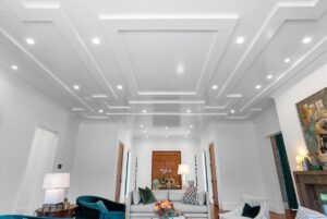 Custom crown molding and ceiling lighting in luxurious Overland Park Kansas home