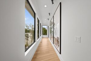 Original art work in hallway of luxury home in Missouri