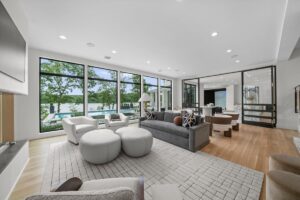 Basement lounge area in luxury custom built Belton MO home