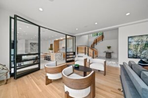 Basement lounge area in luxury custom built Belton MO home