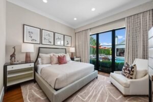 Bedroom and view of the pool in custom luxury home in Johnson County Kansas
