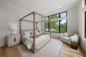 Guest bedroom in luxury custom built Belton MO home