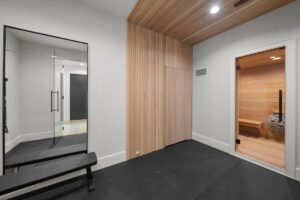 Sauna and workout gym area in luxury custom built Belton MO home