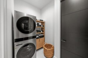Secondary laundry room in luxury custom built Belton MO home