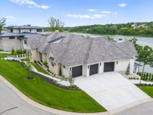 Garage side view of custom built Belton MO home