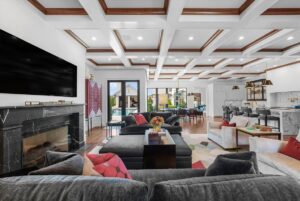 Living room with custom crown molding in luxury Overland Park KS home
