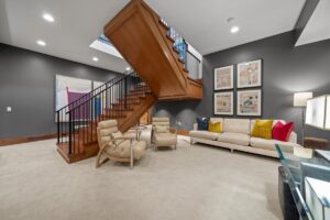 Stairs down to the basement in luxury Overland Park KS home