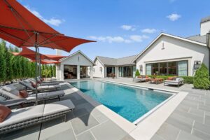 Outside deck and pool at luxury home in Overland Park Kansas