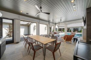 Outside patio with fireplace and tv at luxury home in Overland Park Kansas