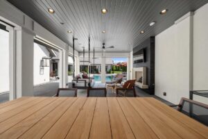 Outside patio with fireplace and tv at luxury home in Overland Park Kansas