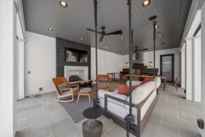 Indoor/Outdoor kitchen and eating area at luxurious Overland Park Kansas ranch