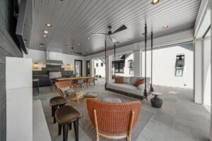 Indoor/Outdoor kitchen and eating area at luxurious Overland Park Kansas ranch